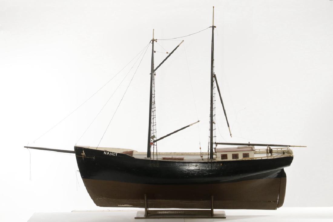 LARGE SHIP MODEL: Two-Mast Schooner 'Nancy' in an early 19th c. pattern, with black and brown hull, black masts with white tips, rigged, no sails, possibly the legendary HMS Nancy, that supplied the British troops in C