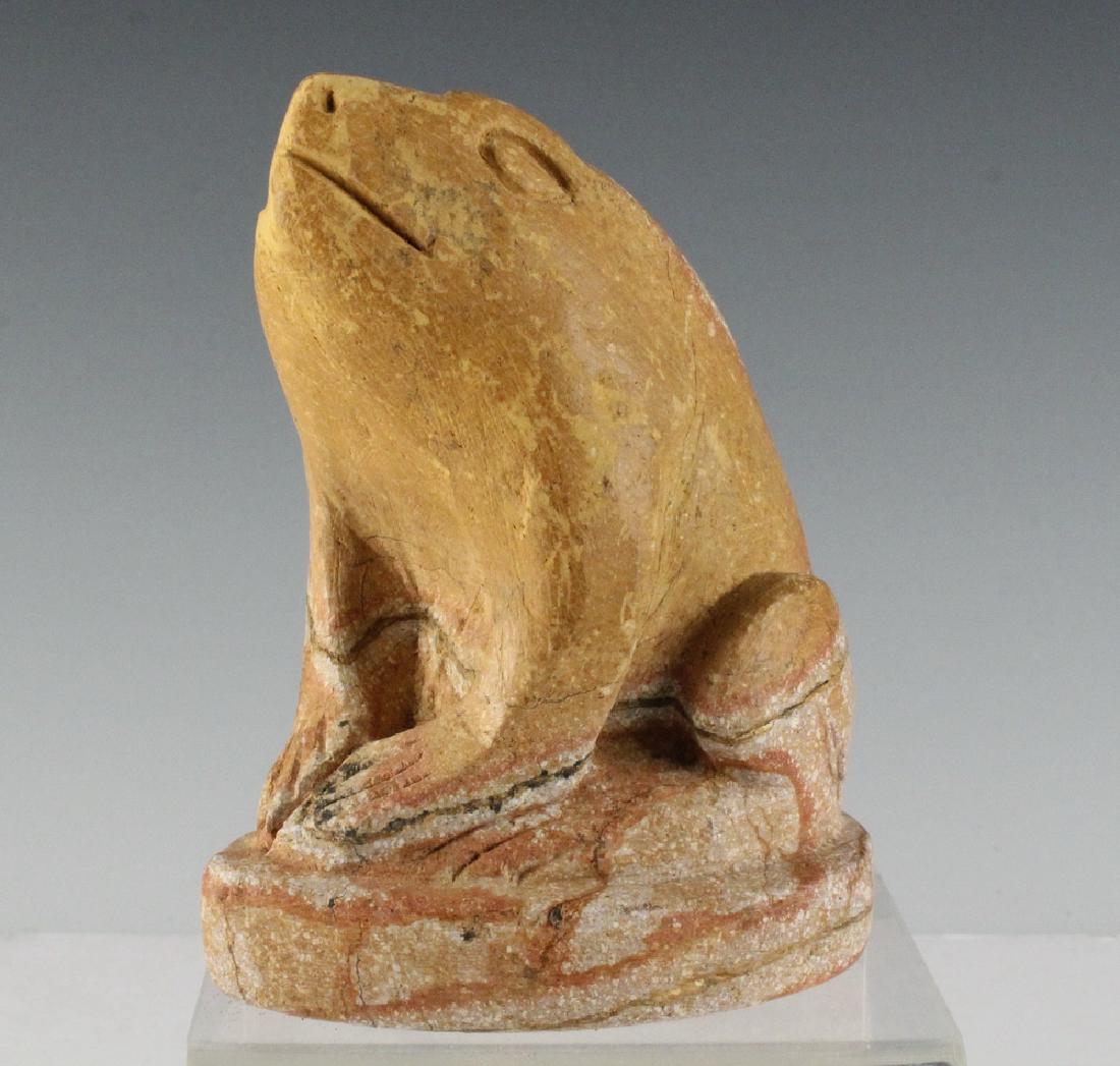 FOLK ART SOAPSTONE CARVING: Seated Frog in mottled yellow ochre soapstone, early 20th c., found in Maine, 5" tall. Good condition.