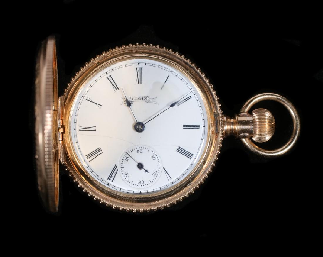 LADY'S POCKET WATCH: Victorian Engraved Pocket Watch in 14K yellow gold by Elgin, engraved "From Mama, April 28, 1889", serial #3038135. 1 1/4" diameter. Appears to be running. Stored in safe deposit box for many years.