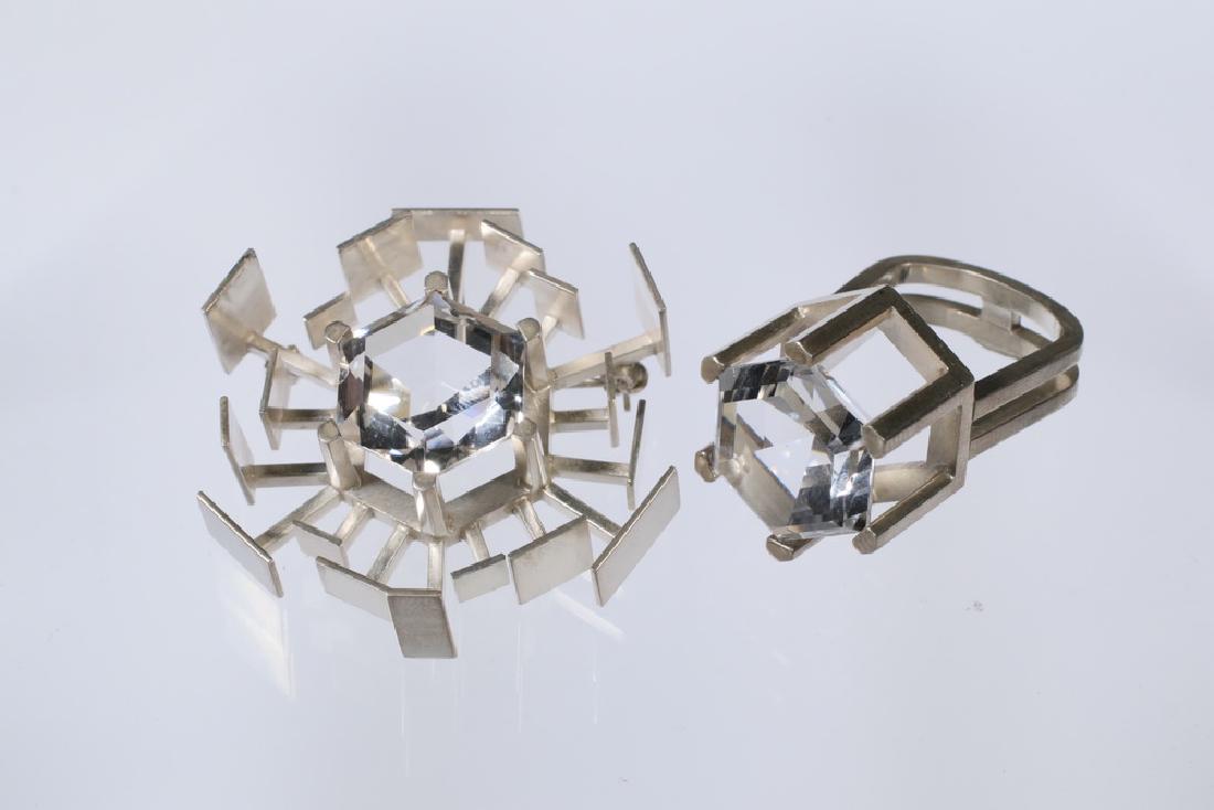 2 PC. JEWELRY SUITE: Modern Ray Urban Design Sputnick Form Brooch with hexagonal crystal stone with associated ring by Age Fausing Silver, Copenhagen, Denamark. Brooch size 1 3/4" diameter, ring size 6 1/2.