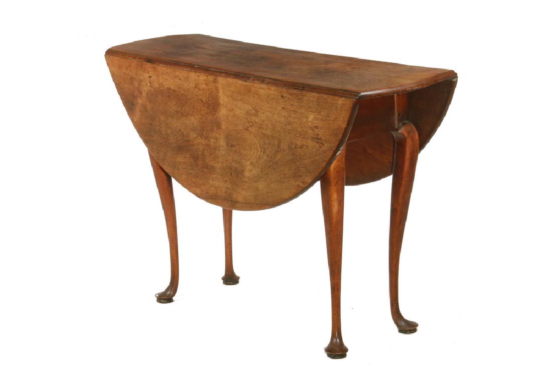 18TH C. NEW ENGLAND COUNTRY BREAKFAST TABLE: Circa 1730-50 Queen Anne Oval Drop Leaf Table in cherry, probably Connecticut, having four cabriole legs terminating in pad feet, two which swing to support leaves, 28" x 42" x 14", with 13 1/2" leave