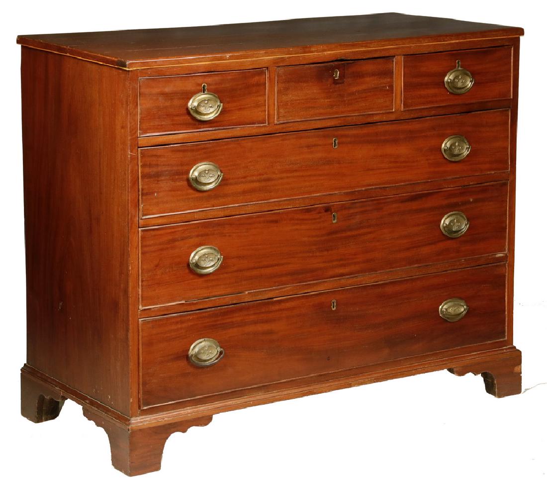 CHIPPENDALE CHEST OF DRAWERS: Mahogany Dresser with flush top having a double boxwood string inlaid edge, three over three graduated beaded edge drawers, all but the upper center having oval brasses, pine secondary, resting on mol