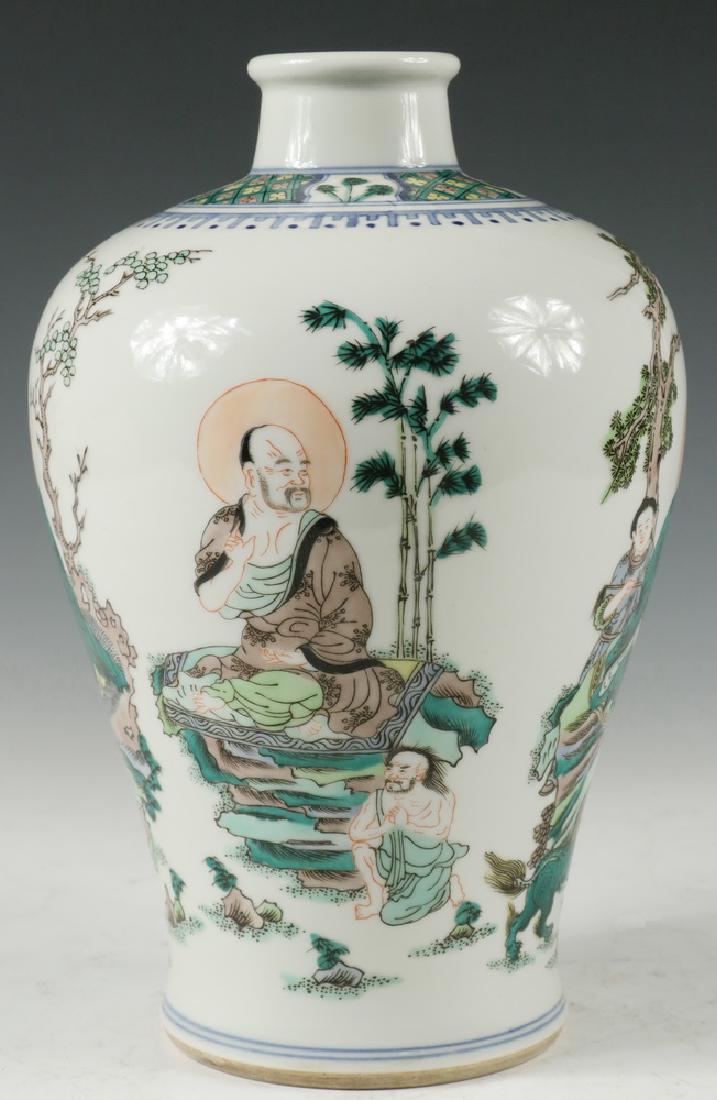 CHINESE MEIPING VASE: Chinese Porcelain Vase, with multiple seated scholar images in greens, yellows and blues, blue six character Kangxi mark on base, 10" tall, 6 1/2" diam. Good condition, no chips, cracks or damage.