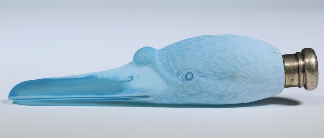 THOMAS WEBB SWAN'S HEAD PERFUME BOTTLE: Late 19th c. English Blue Cameo Glass Swan's Head Form Perfume Bottle by Thomas Webb, with nicely carved feathers and features, embossed "Rd 11109" to underside just below lid, sterling silver mounted