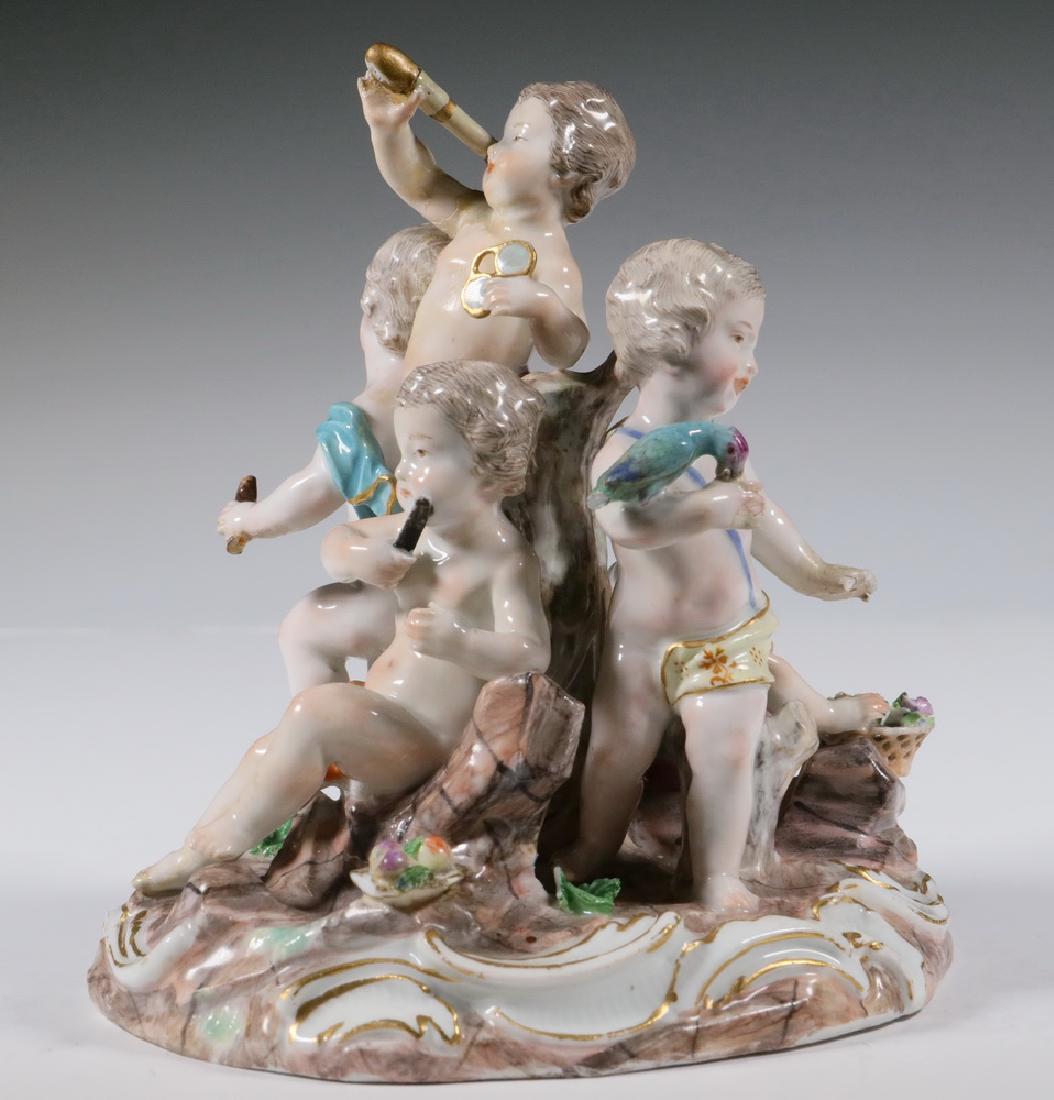 PORCELAIN FIGURAL GROUP: Meissen Porcelain Figurine of Five Putti, late 18th - early 19th c., polychrome and gilded decoration, blue crossed swords mark, 6" high, 6" x 5". Central figure arm reattached, looking glass repair,