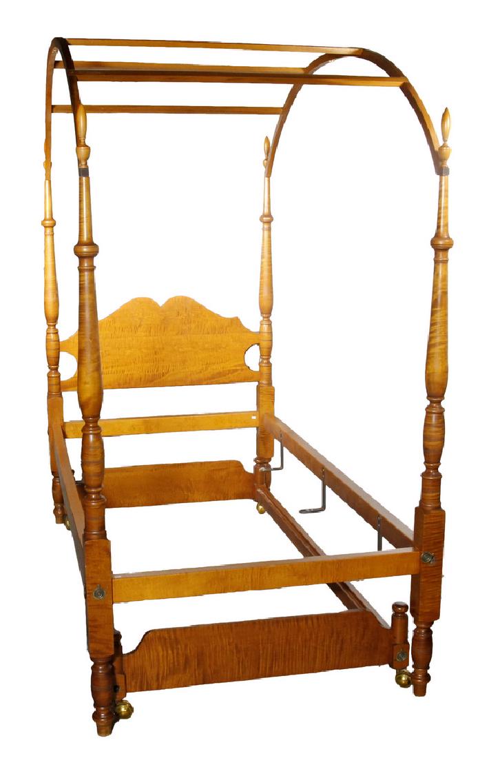 ELDRED WHEELER TIGER MAPLE BED: Highest quality custom Tiger Maple Twin Canopy Bed with trundle bed by Eldred Wheeler of Hingham, Mass., with his label on back of headboard, having an arched canopy with blue sky top and sheer drapes