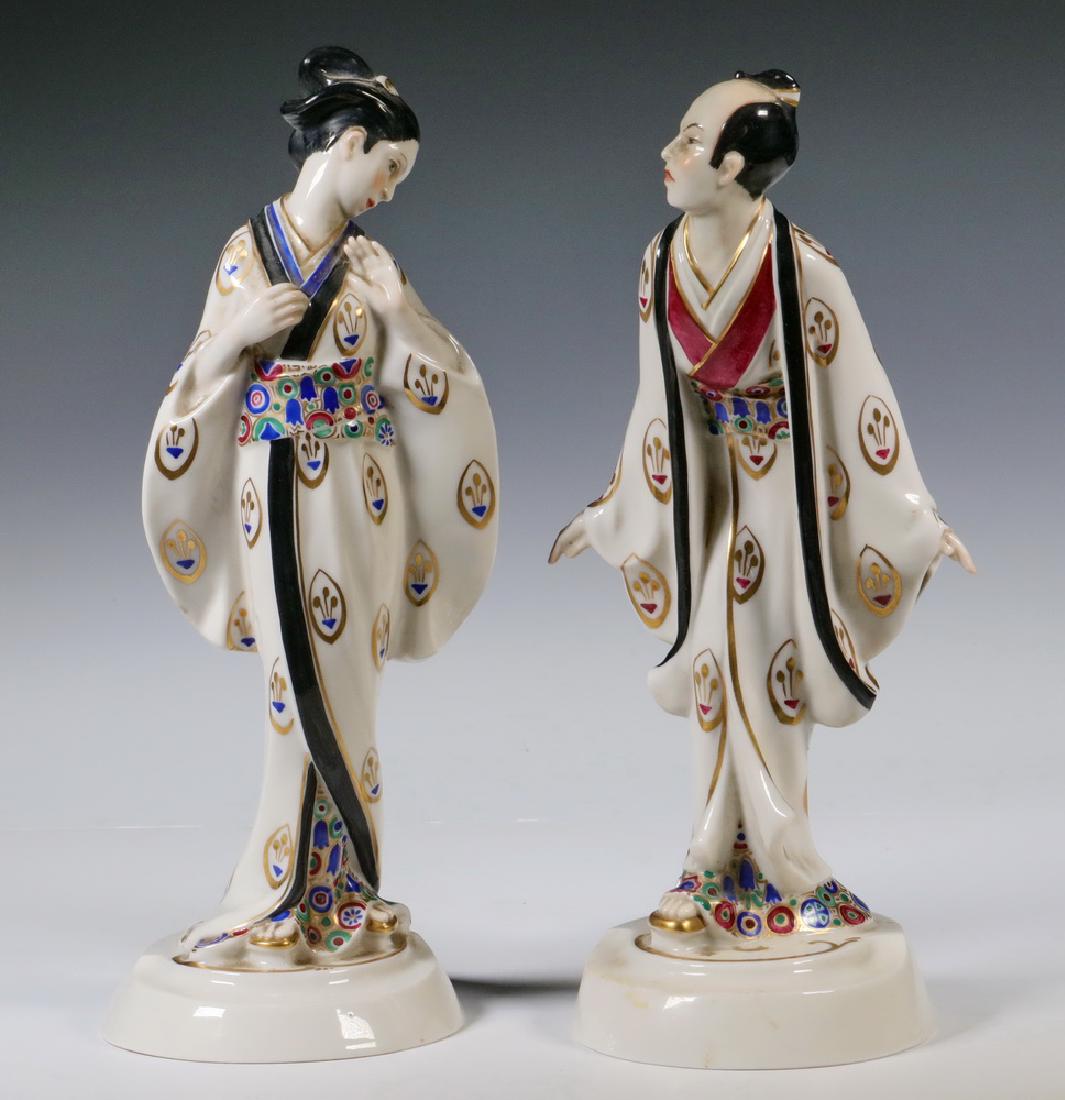 PR GERMAN PORCELAIN JAPANESE FIGURES: Pair of Early 20th c. Schwarzburger German Porcelain Japanese Figures, #U50 and U51, delicately executed with hand painted gilt and polychrome decoration, impressed Schwarzburger Werkstaetten mark wit