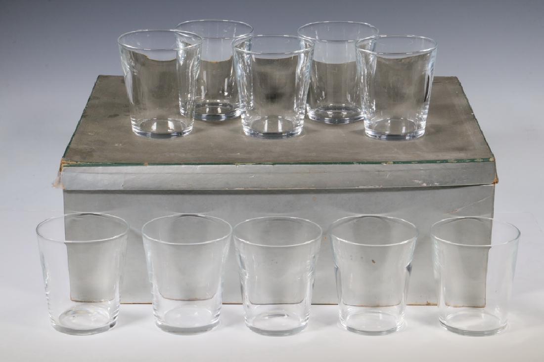 (10) CASED STEUBEN GLASSES: Cased Group of (10) Steuben Clear Rocks Glasses, each with etched 'S' on base, each glass in a felt Steuben bag and packed in a vintage Steuben branded cardboard box, 4 1/4" high, 3 7/8" diam. Box wea