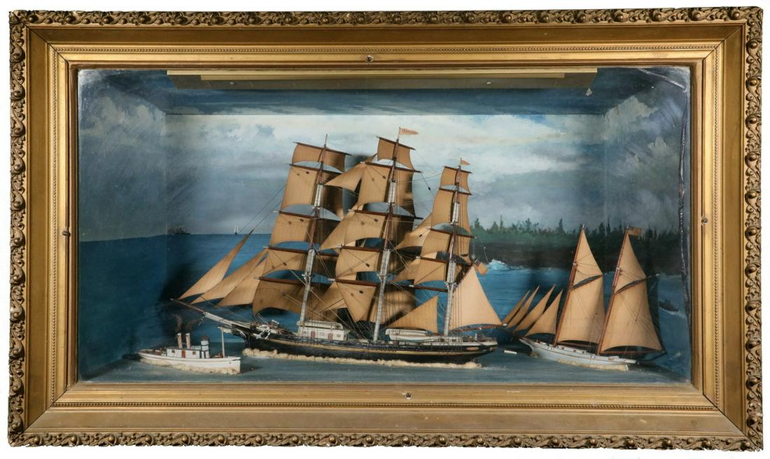 LARGE NAUTICAL DIORAMA IN DEEP SHADOWBOX: Turn-of-the-Century Fully Dimensional Ships in deep diorama of a busy harbor, including a three-mast sailing merchant ship, a two-mast white-hulled schooner and a steam pilot boat, mounted on a raked 
