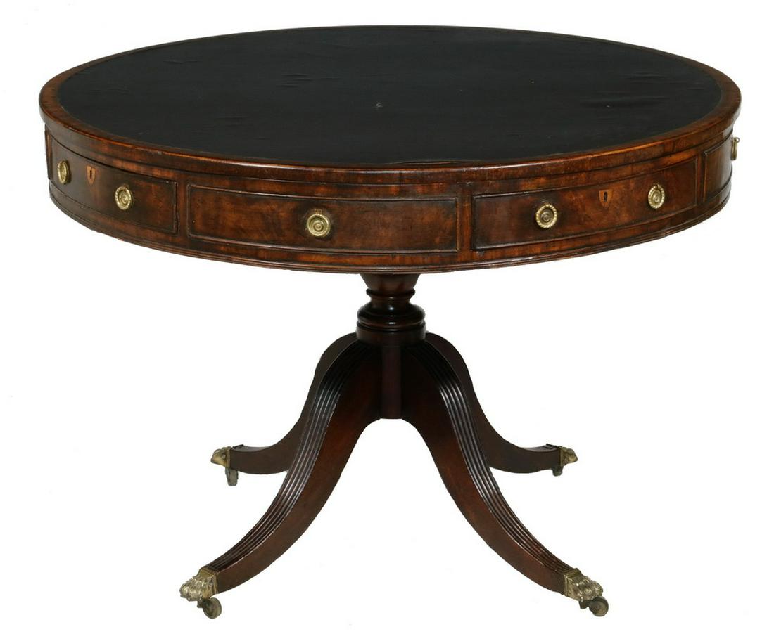 18TH C. ENGLISH MAHOGANY RENT TABLE: George III Period Mahogany Rent Table, with removable circular top and base center, black leather cover to top surface, frieze with four real drawers and four faux drawer fronts, brass drop pulls and 