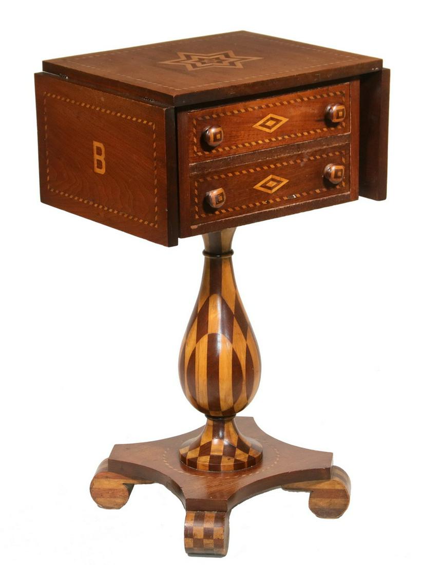 FOLK ART INLAID DROP LEAF WORK STAND WITH FIREHOUSE: Mahogany, Boxwood and Walnut Marquetry Table with American Folk Art Fancy Work, a six point star center top, the letter "B" on the drop leaves, the two drawers with rope banding, center diamond and mu
