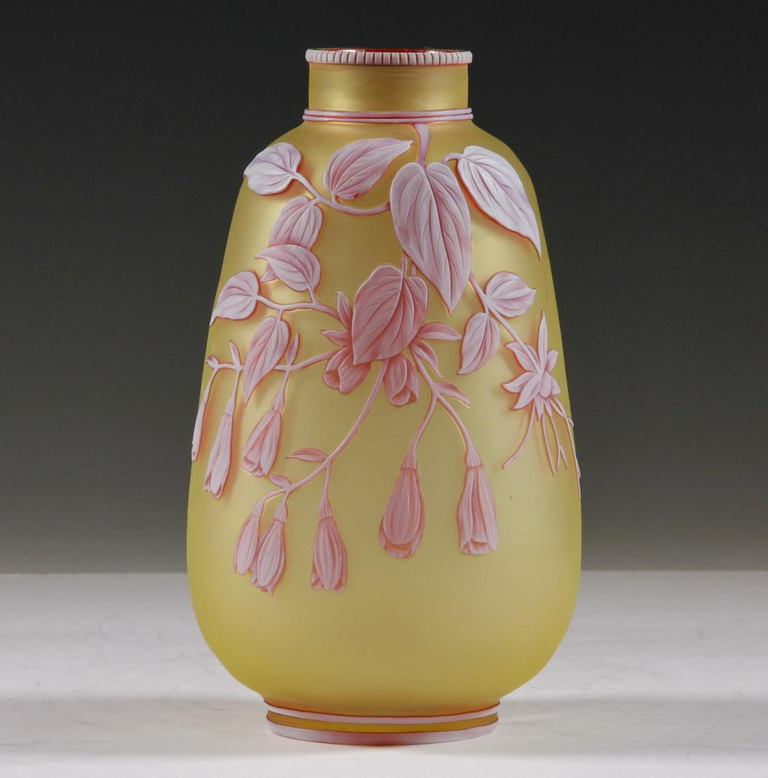 CAMEO GLASS VASE ATTRIBUTED TO THOMAS WEBB: 19th c. English Cameo Glass Vase, probably by Thomas Webb & Sons (Stourbridge, England), with carved white and red trumpet lily and butterfly decoration over a lemon ground, unsigned, 7" high, 4" diam