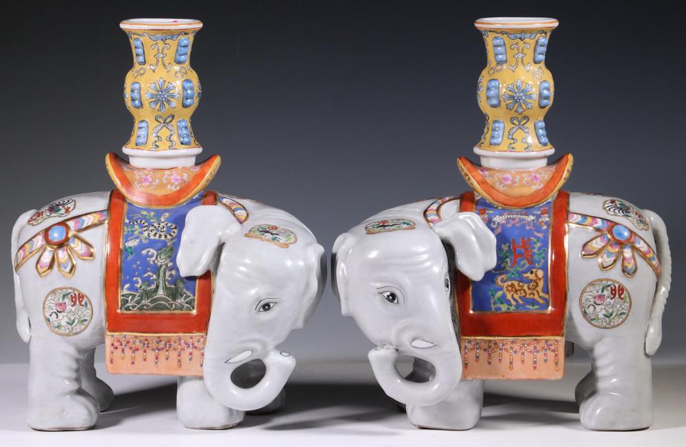 PR CHINESE ELEPHANT CANDLE HOLDERS: Pair of 20th c. Chinese Porcelain Elephant Form Candle Holders, with brightly painted decoration, 12" high.