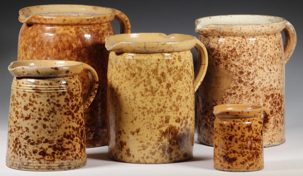 (5) FRENCH COUNTRY POTTERY JUGS: Group of (5) 19th c. French Spatter Decorated Earthenware Jugs, all wheel thrown and cylindrical shaped, 4 3/4" high to 11" high. Most have glaze flakes, glaze losses and rim/edge chips.