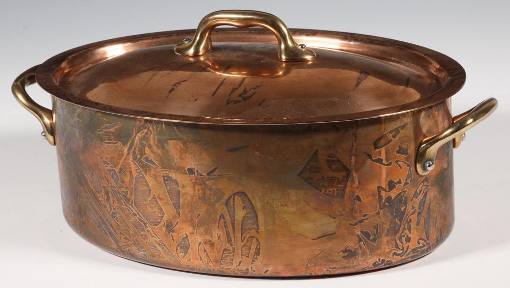 FRENCH OVAL COPPER POT: Williams Sonoma Lidded Oval Copper Stew Pan or Dutch Oven, made in France, 20th c., with brass lid and side handles, stainless steel lining, 6" high, 12 1/4" x 7 5/8". Tarnished.