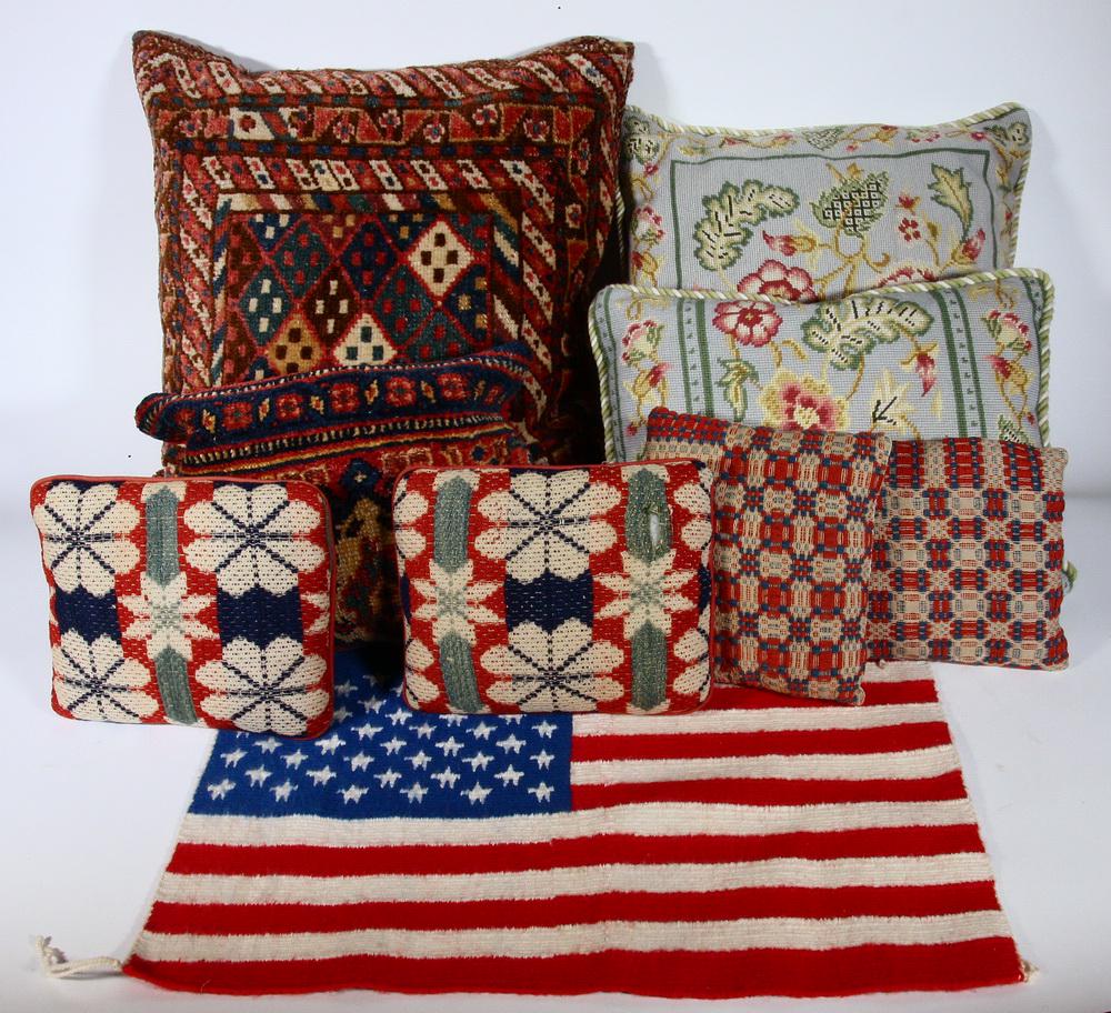 (8) ASSORTED THROW PILLOWS & (1) FLAG DESIGN TEXTILE: Collection of (9) Decorative Textiles, including: (4) Pillows with tops from antique coverlets, off white cloth backing, 8 3/4" x 7 3/4" to 10 3/4" x 8 1/2", largest has a tear to coverlet; (2) Pillow