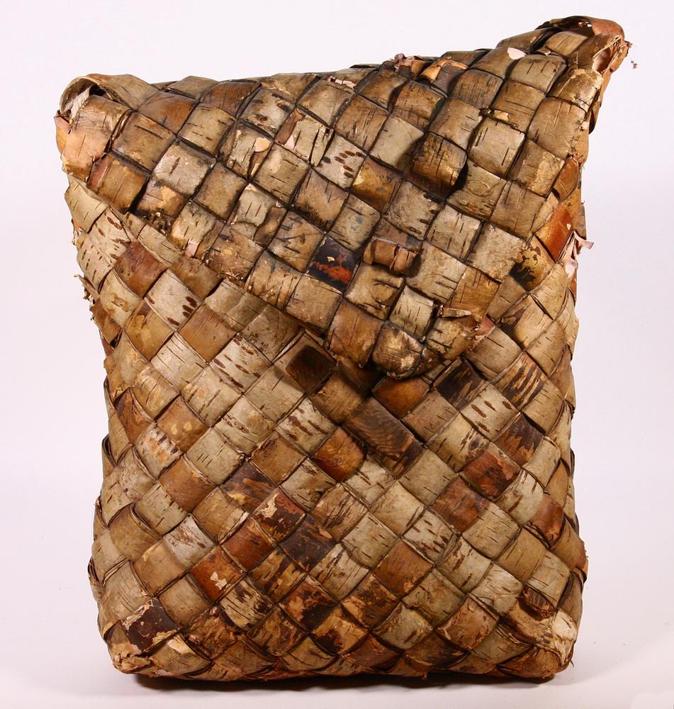 WOVEN BIRCH PACK BASKET: 19th c. Woven Birch Pack Basket, possibly Swedish, with envelope form front flap, fitted with hardware for hanging on a wall, 19" high, 16 1/2" x 6". Surface wear and losses, especially to sides of to