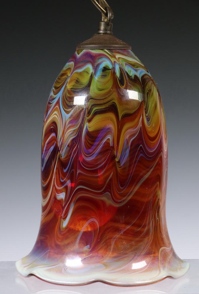 BLOWN ART GLASS HANGING LAMP: Contemporary Crafted Studio Art Glass Hanging Lamp, unsigned but probably by Salamandra (Portsmouth, NH), tulip form shade with ruffled rim, multicolored swirl decoration, single socket fixture with h