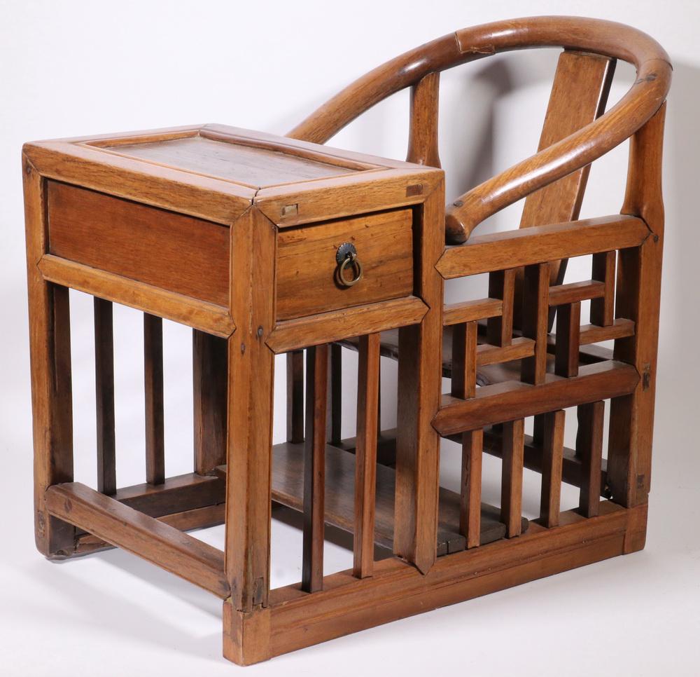 CHINESE CHILD'S DESK: Antique Chinese Elmwood Child's Desk or Feeding Chair, a single piece of furniture integrating a horseshoe back armchair and small size writing desk with single side drawer, shaped openwork seat, side