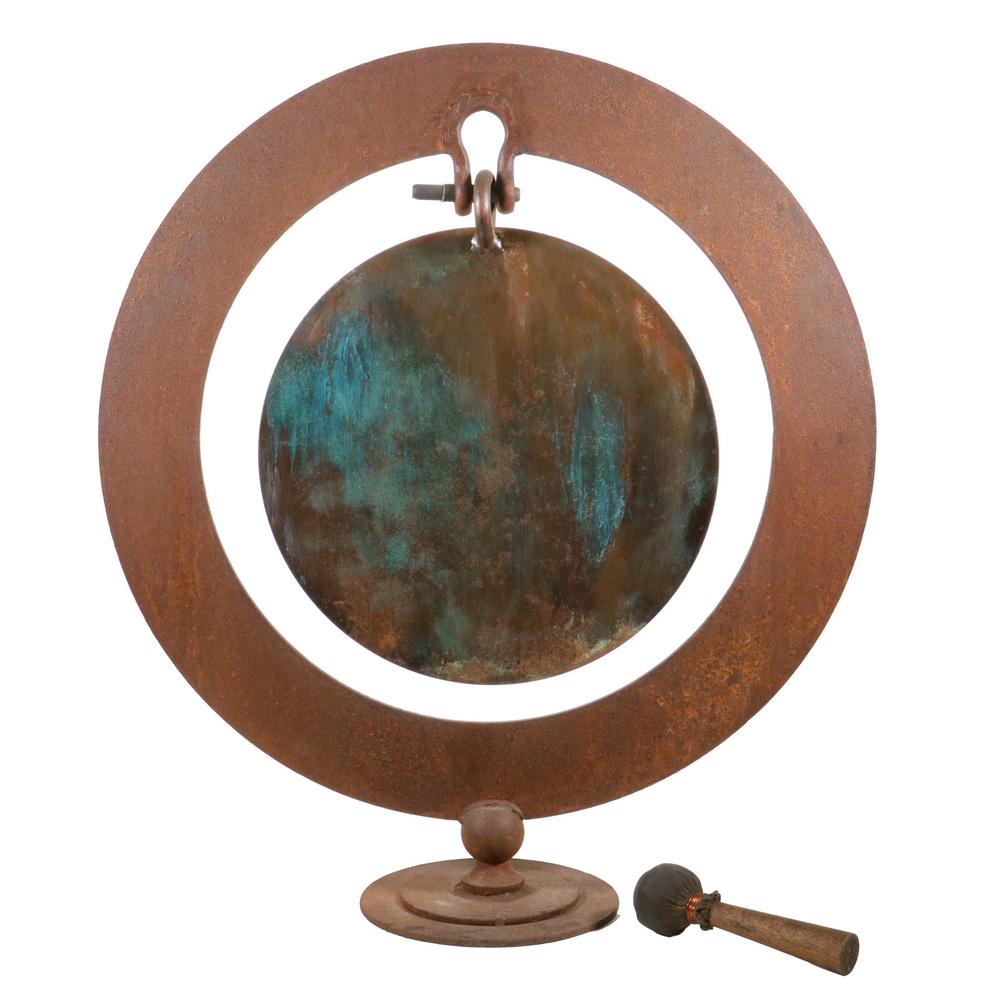 GONG WITH MALLET IN IRON STAND: Asian Floor Standing Iron Gong, mounted in a heavy wrought iron stand with round base, with wooden handled and leather covered mallet, gong: 14" diam, stand: 26" high 23" wide. Surface rust.