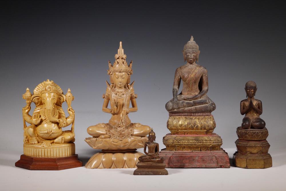 (5) ASIAN DEITY FIGURES: Collection of (5) Assorted Wooden Statues, 20th c., including: Indonesian carved wooden Buddha figure, sitting cross legged on a lotus throne, marked 'OKA' on base, 10" high; (2) Thai carved wooden se