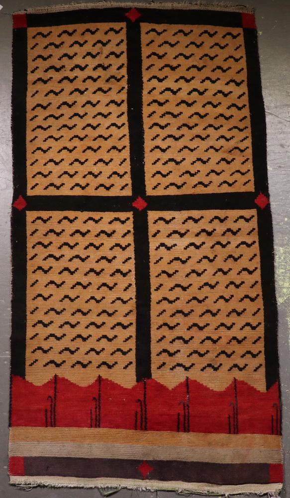 UZBEK RUG - 3: Central Asia, second quarter 20th c., four rectangular compartments inset with cloud bands on a gold field, plain aubergine border. Good pile, small stains.
