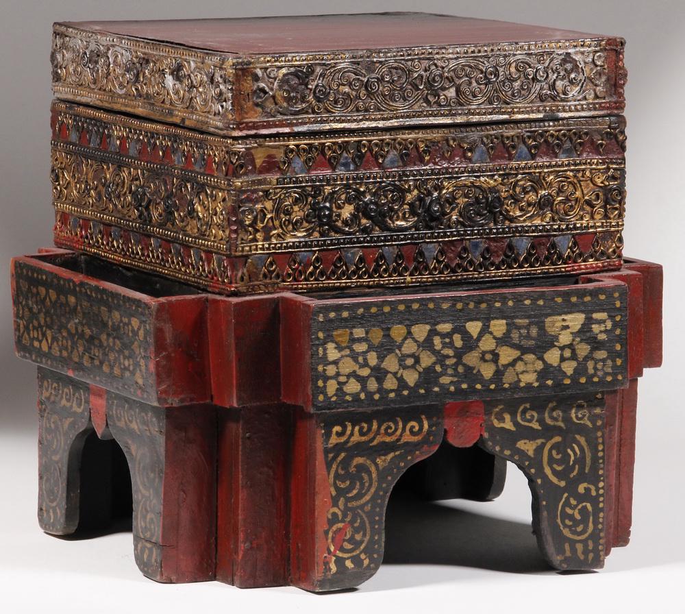 INDONESIAN CARVED BOX: Indonesian Fancy Carved and Painted Wooden Lidded Trinket Box, attached to intricate wooden base, with lift lid, black painted interior, 9 3/8" high, 10 1/4" sq. Minor surface wear, paint losses, lid 
