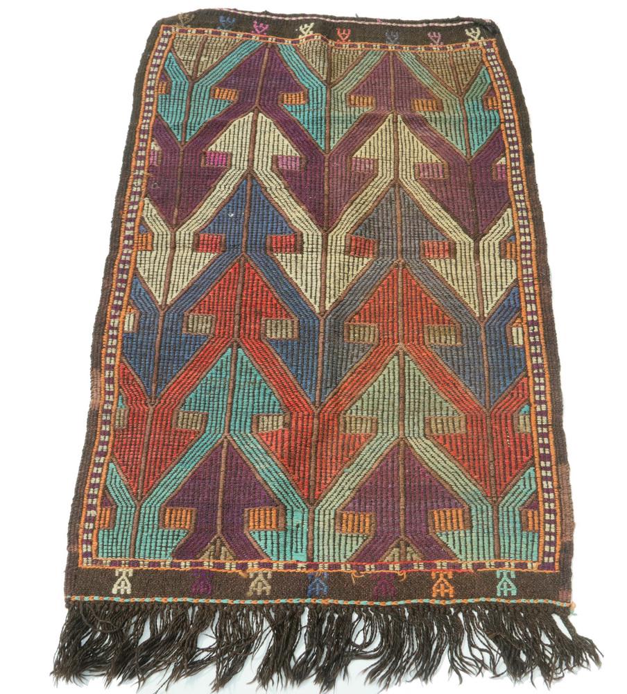 WOVEN MAT - 4'-2" x 2'-8": Flat woven and single fringe. Geometric alternating arrow pattern. Multicolor. Good condition.