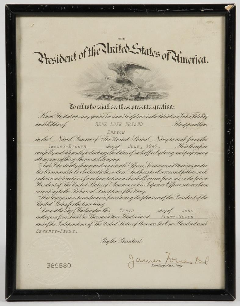 FRAMED JAMES FORRESTAL SIGNED COMMISSION: June 10, 1947 Commission for Ensign Rene Luke Briand in the US Navy, signed by James Forrestal (1892-1949) as Secretary of the Navy. In black stick frame under glass, 11" x 8 1/2". Good condition.