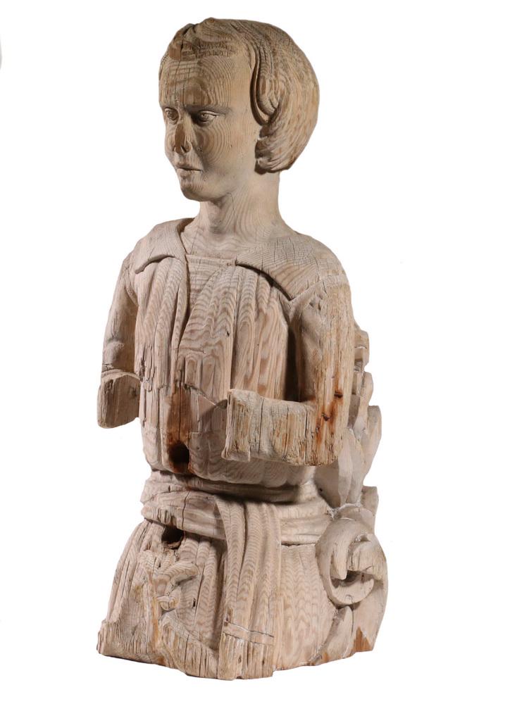 SMALL EARLY CONTINENTAL CARVED WOOD SHIP'S FIGUREHEAD: Salvaged 18th c. Waist Length Figure of a Small Boy in Medieval costume, carved from a single section of yellow pine, with leaf and scrollwork at his back, his arms partly raised and missing hands, hi
