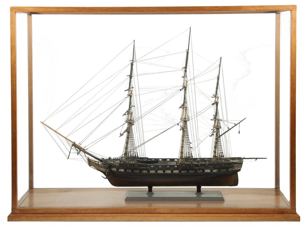19TH C. GUNBOAT SHIP MODEL: Cased Model of the USS Constitution, "Old Ironsides", launched 1797 in Boston, correct in every detail, fully rigged but without sail, having figurehead and brass cannons, in mahogany and glass case,