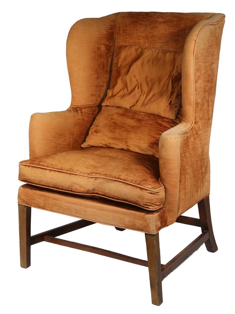 18TH C. HEPPLEWHITE WING CHAIR: Mahogany Frame with Pumpkin Velvet Upholstery, having a flat back, medium depth cyma curved wings, setback vertical scrolled arms, self-corded, with loose down cushion and two small back pillows, simp
