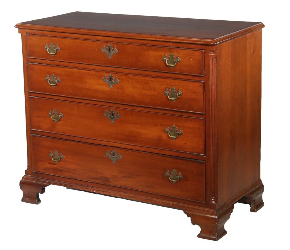 FOUR-DRAWER CHIPPENDALE CHEST: American Chest in Honduras mahogany, with molded top, four graduated beaded edge drawers, fluted quarter columns, replaced brasses, pine secondary, molded base, ogee bracket feet, 33" x 42" x 19". Goo
