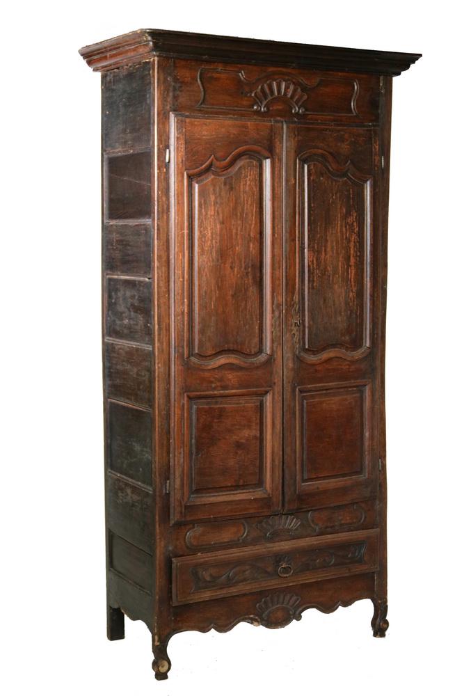 FRENCH PROVINCIAL TALL WARDROBE: 18th c. Walnut Armoire, two door with molded cornice, scroll and shell carved decoration, with shallow drawer below doors, panel sides, shaped and carved skirt, on scrolled front legs, square back leg