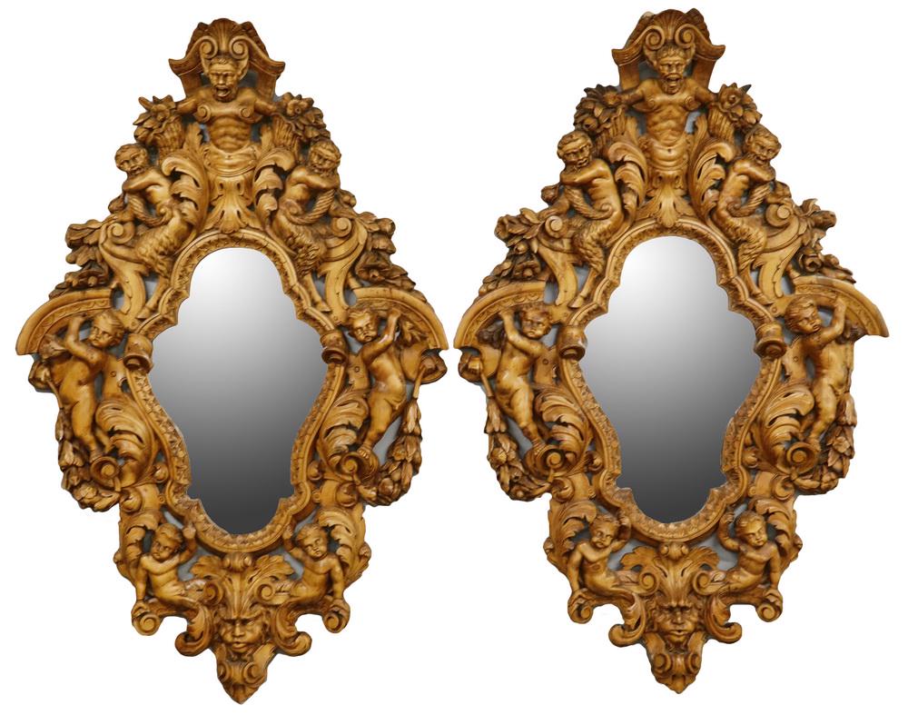 PAIR OF 20TH C. LARGE BAROQUE STYLE MIRRORS: Large Pair of Oval Entry Mirrors, hand carved hardwood, natural finish, with multiple figures, reticulated in deep relief, Satyrs at top, Cherubs below, complex scrolling of acanthus leaves, Green Man