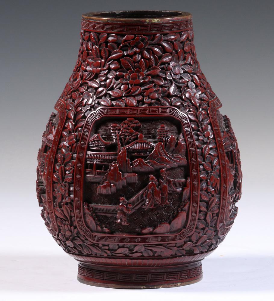 FINEST QUALITY MIDDLE QING CINNABAR VASE: Richly Colored Story Vase in Bulbous Sung Form, in carved red lacquer over bronze with a Qianlong (1736-1795) mark on the underside, of the type â€˜Respect for and courtesy towards Duke Jing', ill