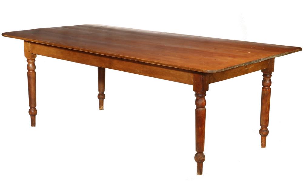 COUNTRY HARVEST TABLE: Custom American Pine Harvest Table, crafted from old wood, with overhanging curved corner top, straight frieze and turned legs, 29 1/2" high, 83" x 41 1/2". Minor surface scratches and abrasions.