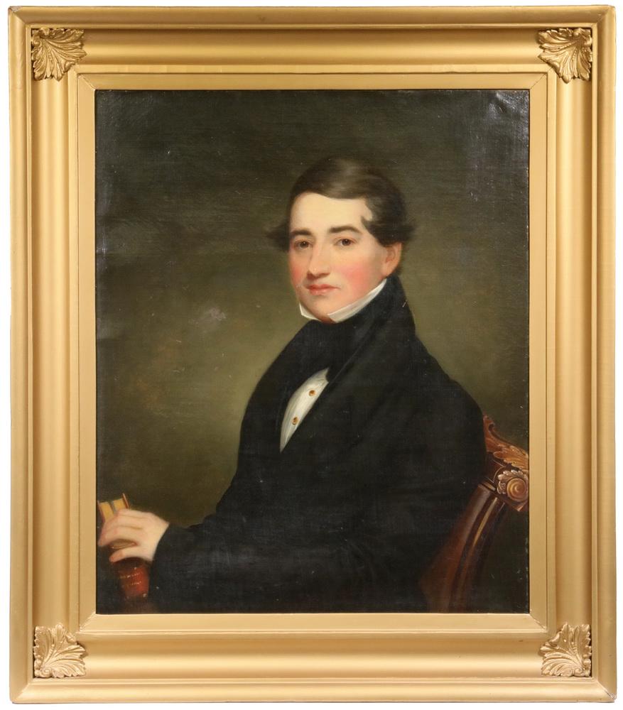 BOSTON SCHOOL PORTRAIT: Portrait of a Young Gentleman, probably a Doctor, he is seated in an ornate chair, holding a book on Physiology, oil on canvas, unsigned, inscribed in pencil verso "James Samuel Somers, Born 1810, Die