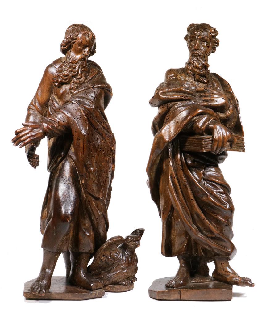 PR CARVED ALLEGORICAL FIGURES: German Gothic Figures of Apostles, one holding large book, the other with an eagle at his feet, carved walnut, natural finish, roughly 17 1/2" tall. Wormage, minor losses, nice patina.