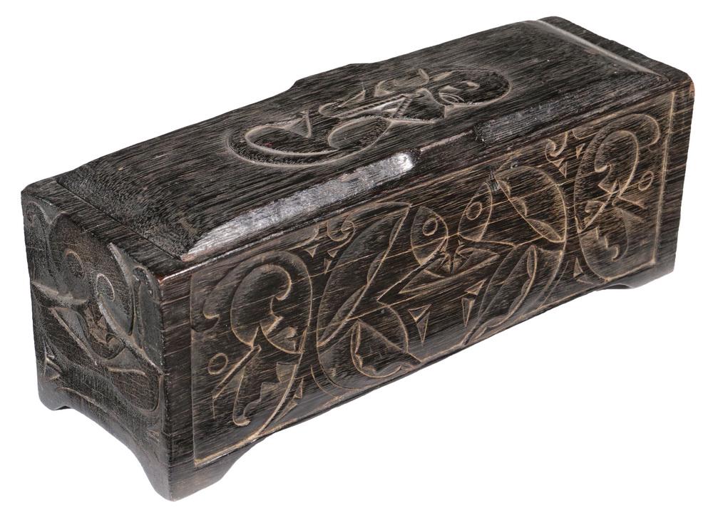 MAORI CARVED WOODEN BOX: New Zealand Maori Hardwood Lidded Trinket Box, 20th c., base carved from a single piece of wood with lid and side panels integrating artisan carved Tiki, Koru and other symbols, standing on four carve