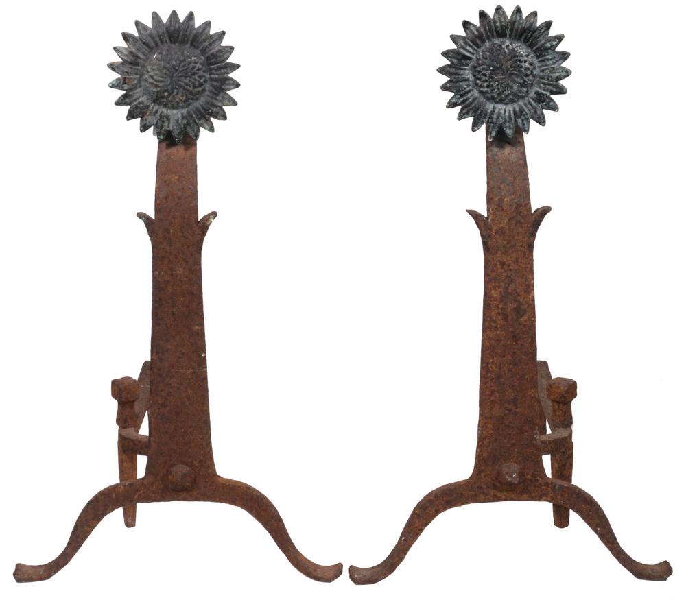 PR SUNFLOWER ANDIRONS: Pair of Early American Iron and Brass Sunflower Form Andirons, with heavy forged iron bases and patinated cast sunflowers, 24 3/4" high, 13 1/2" x 17 1/2". Surface rust.