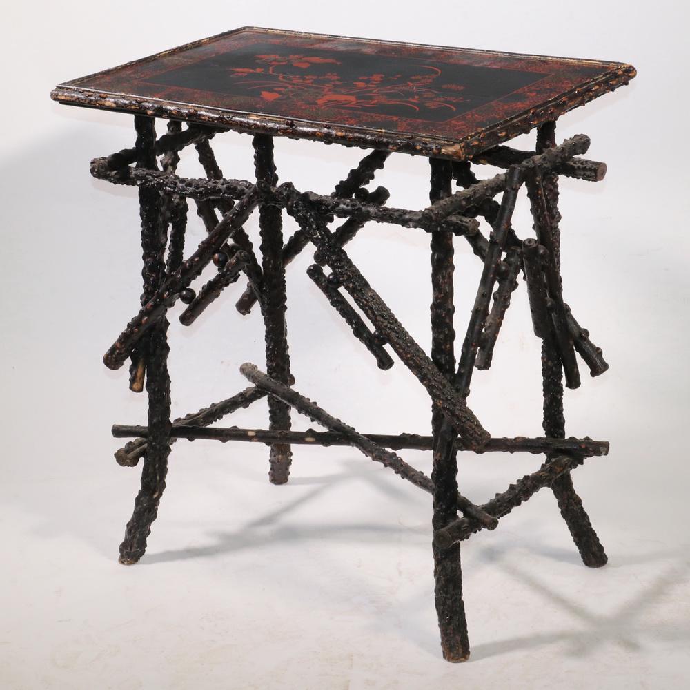 VICTORIAN JAPONISME LAMP TABLE: Circa 1880s Lacquered Top Stand, probably British made, having Asian style floral motif in red and black, legs and supporting structure in blackthorne branches, 27" x 17" x 24 1/2". Good condition, mi