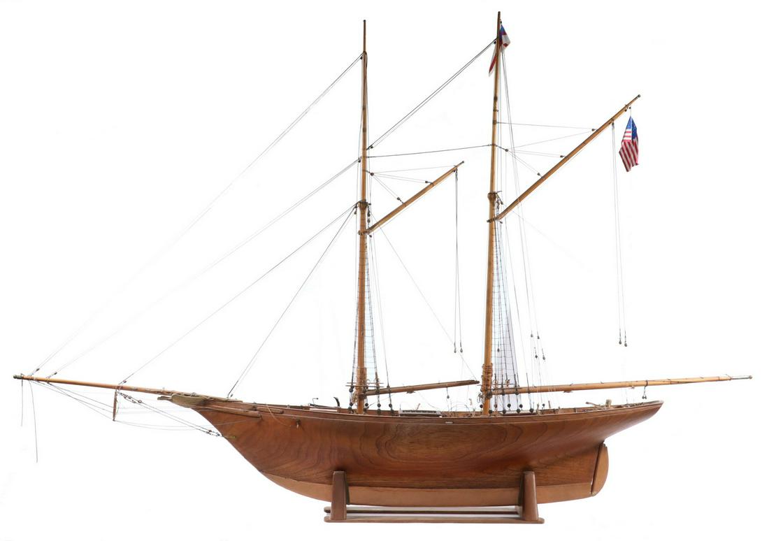 MODEL OF SCHOONER "COLUMBIA": Fully Rigged Wooden Model of the Schooner "Columbia", an American gaff rigged topsail fishing vessel launched in 1923 that was awarded the 1923 International Fisherman's Trophy in Halifax, Nova Scotia