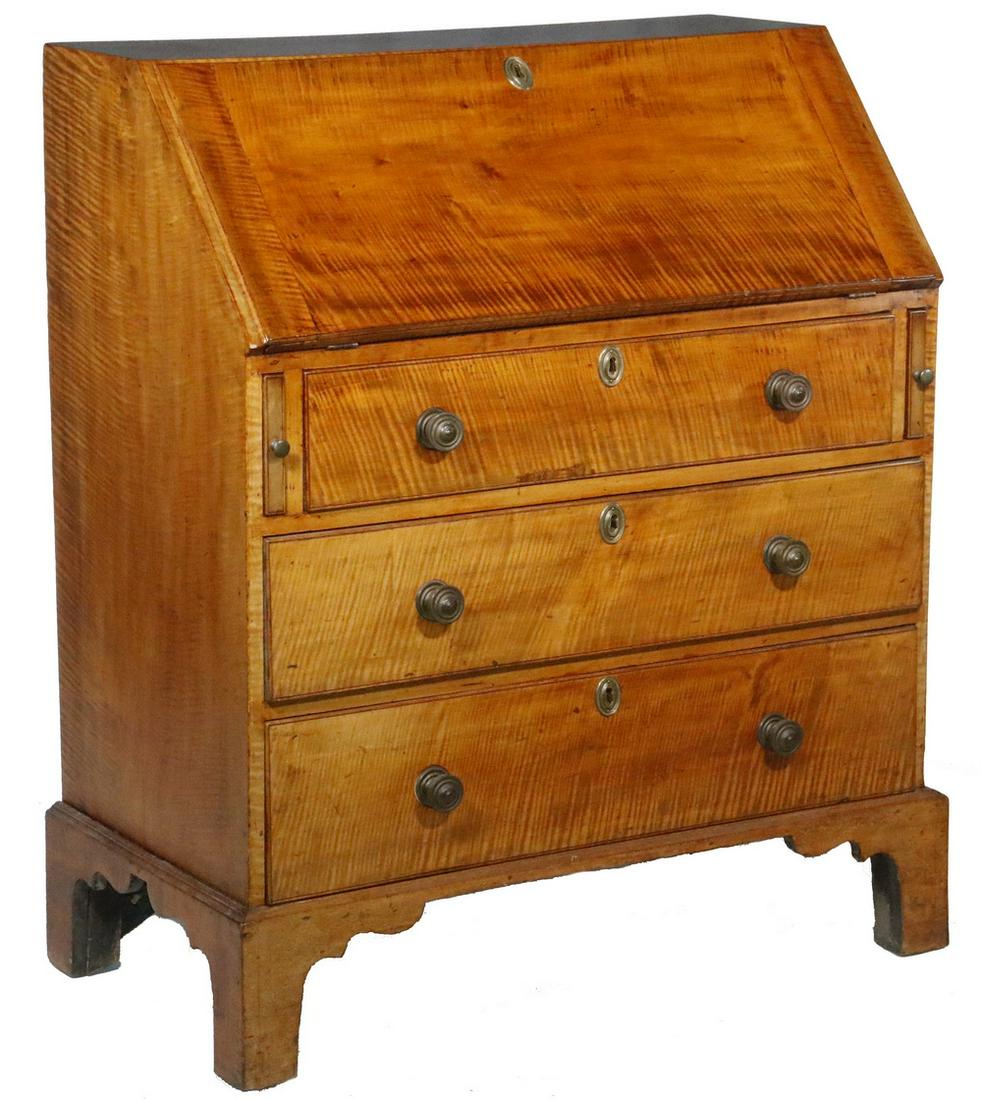 TIGER MAPLE SLANT LID DESK: Late 18th c. American Chippendale Slant Lid Desk, in rampant tiger maple, case top with visible dovetails, 19" single plank sides, lid with breadboard ends, interior fitted with five drawers over two