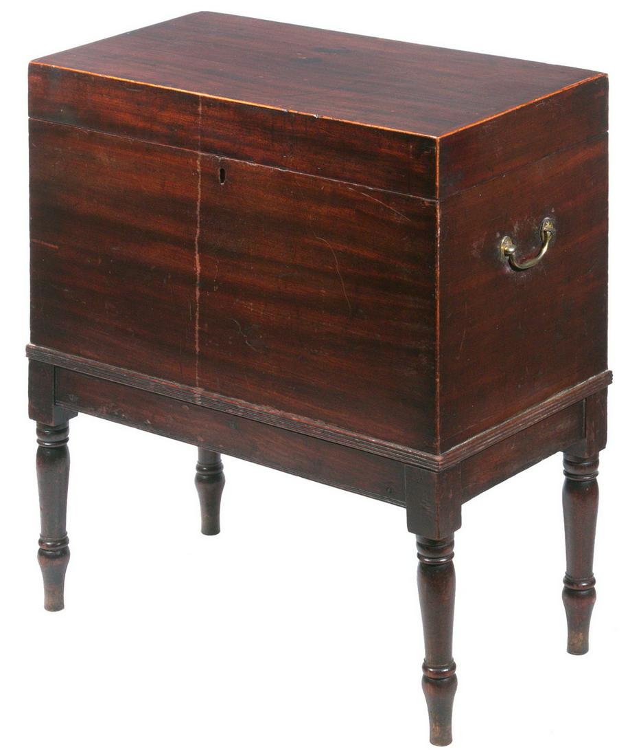 LIQUOR CHEST ON STAND: 19th c. Mahogany Liquor Box with Attached Stand, hinged lift lid, with front lock (no key) and brass drop bail side handles, set on turned legs, interior with slots (for bottle separators), 25 3/4" hi