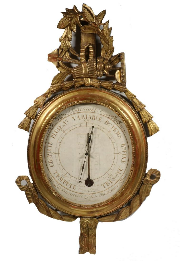 18TH C. FRENCH BAROMETER: Magnificent Carved and Gilt Framed Dial Barometer/Thermometer by Charles Biesse of Orleans, France, dated 1753, the entirety of the dial in hand calligraphy on paper (with a note in a second hand indi