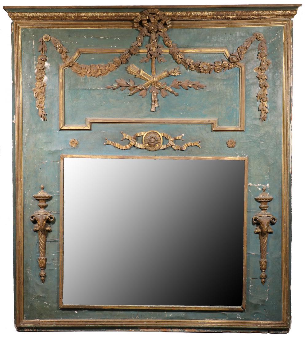 LOUIS XVI TRUMEAU MIRROR: Late 18th c. French Painted and Gilt Architectural Mirror, top molded cornice, green painted gessoed surface with applied gilded decoration, including bow and floral swags, crossed quiver and flambeau