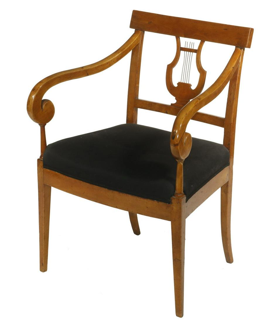 BIEDERMEIER ARMCHAIR: Period Biedermeier Open Arm Desk Chair, early 19th c., with lyre back splat with tapered legs and black upholstered seat, 33" high, 23" x 18". French polish finish, old repair to left arm. Provenance: