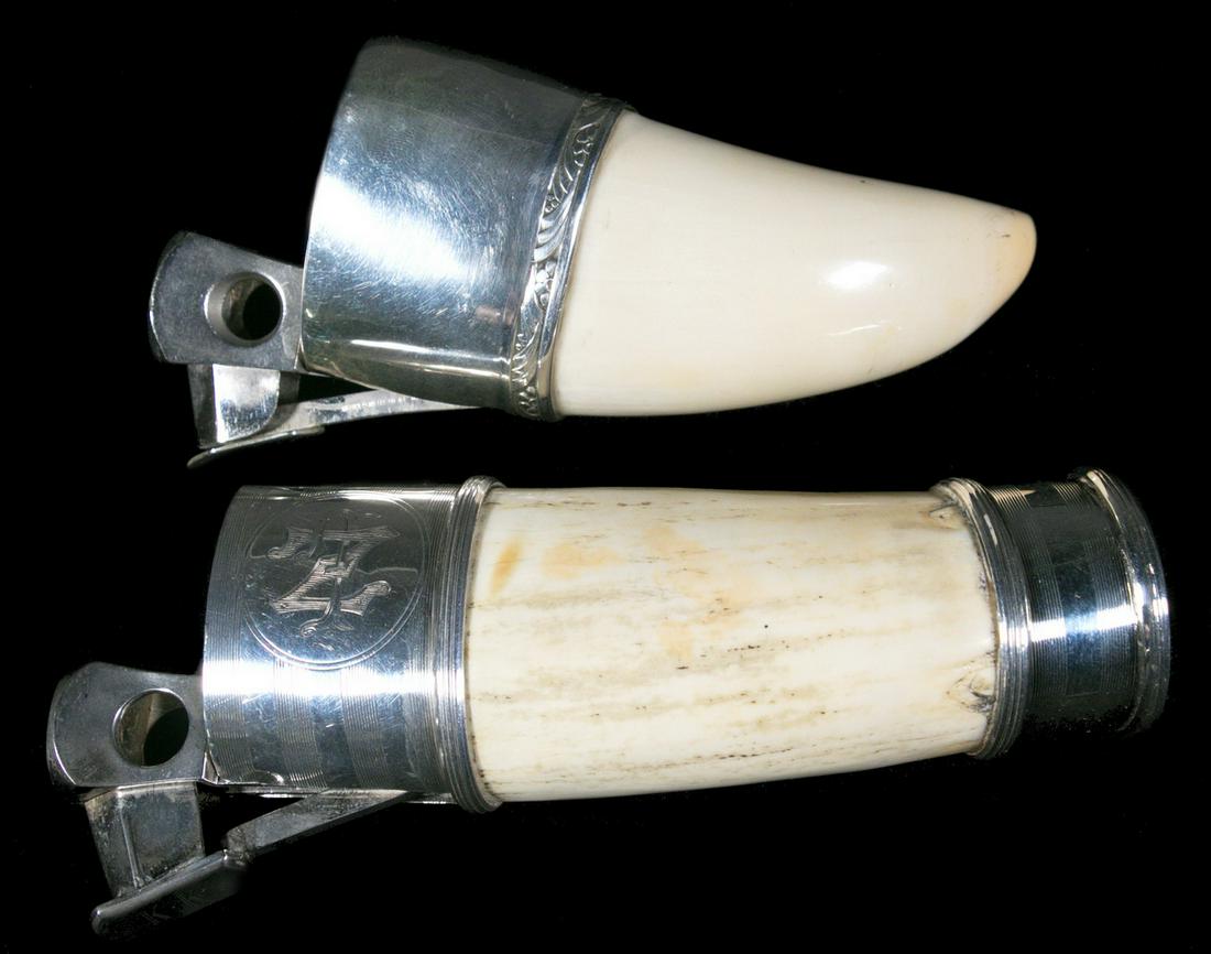 (2) STERLING SILVER MOUNTED CIGAR CUTTERS: (1) Sterling Silver Mounted Whale's Tooth and (1) Sterling Silver Mounted Walrus Tusk Cigar Cutters. With Solingen German stainless blades, incl: Cutter with engraved 'LZ' monogram, mounting marked '9