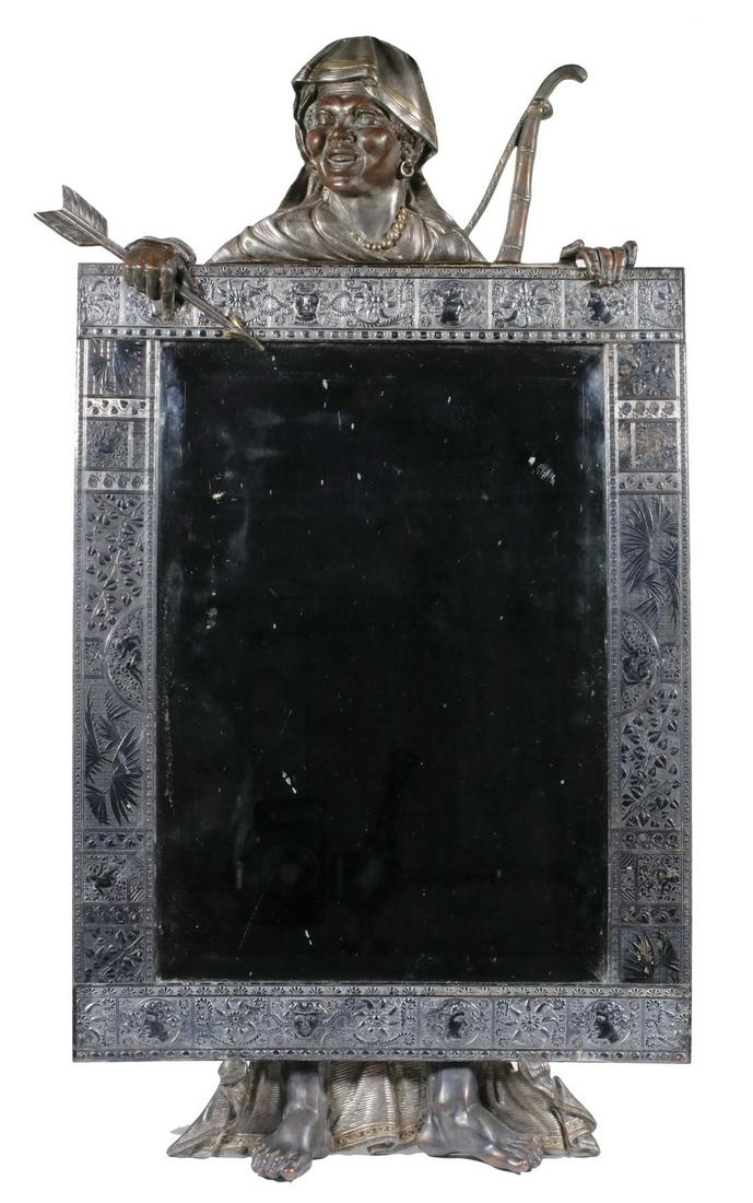 MERIDEN AESTHETIC MOVEMENT TABLE MIRROR: Late 19th c. Figural Table Mirror by Meriden Britannia Company (Meriden, CT, 1852-1898), consisting of a patinated spelter Moorish standing figure supporting a silver-plated frame decorated with masks